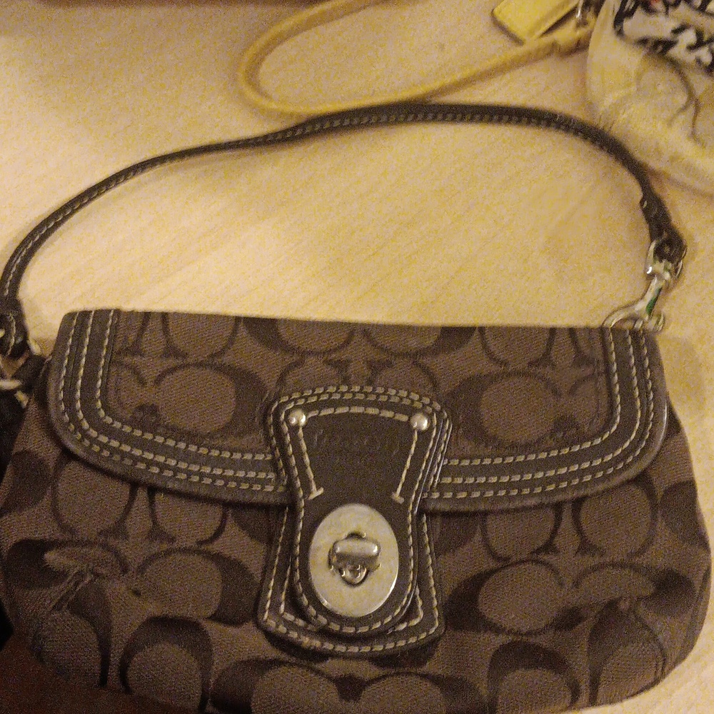 Brown wristlet almoast new